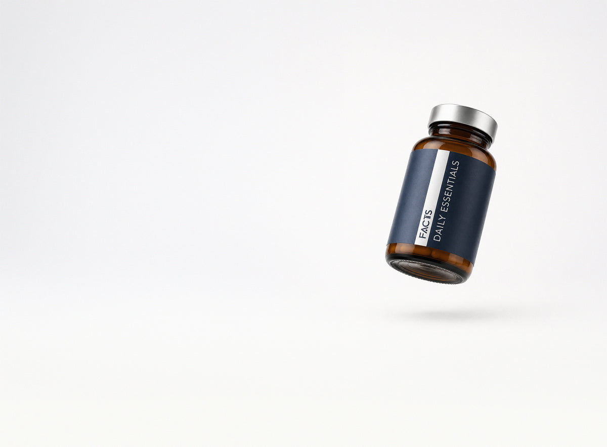 Daily Essentials: floating amber glass bottle, studio lighting
